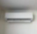heat pump on white wall