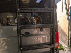 VW Crafter campervan rear door storage cargo rack.