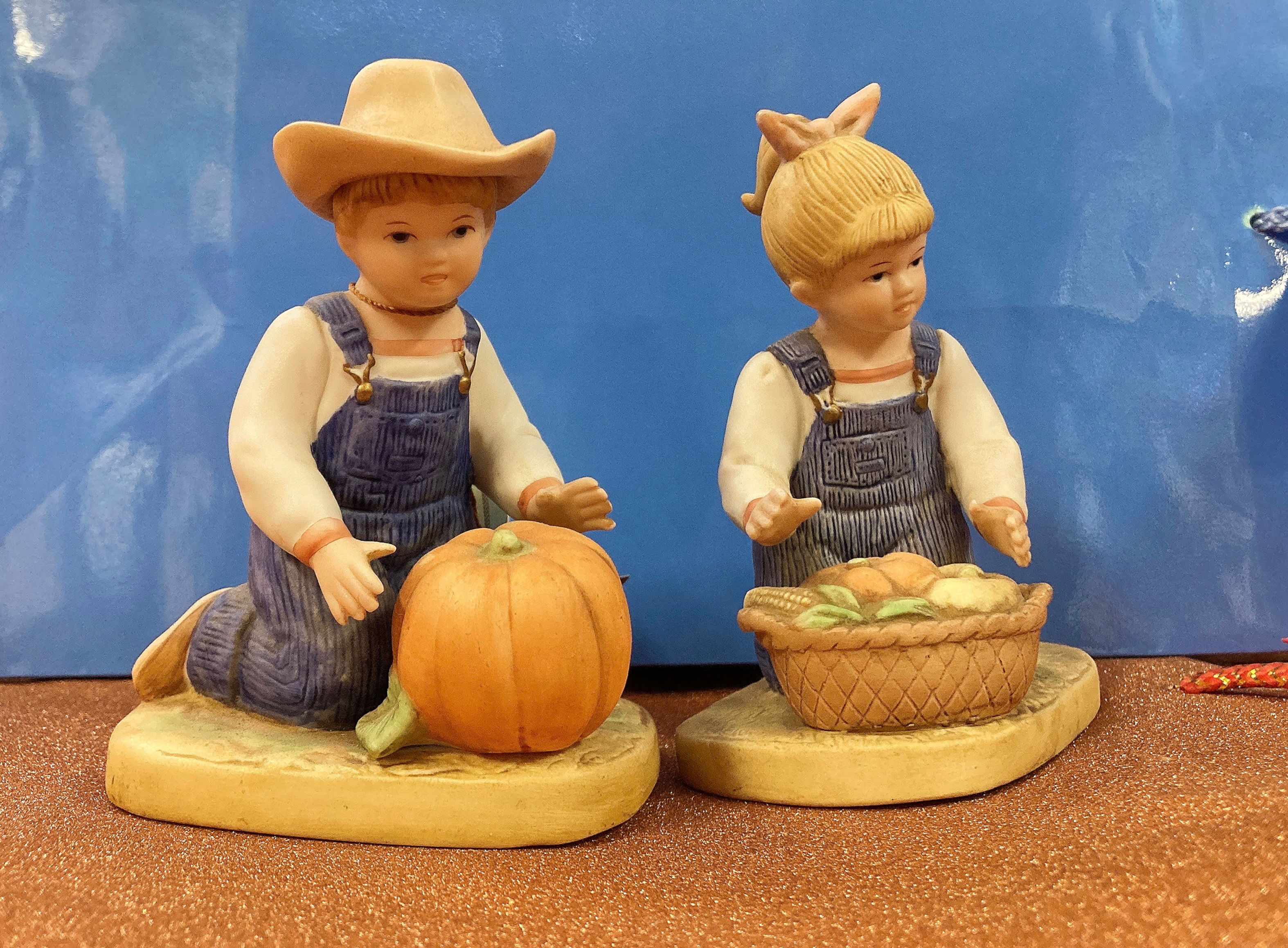 Hand painted porcelain statuette “Harvest Helpers”