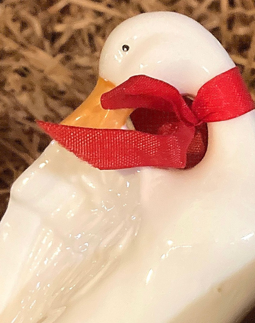 Darling miniature duck with red ribbon figurine