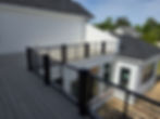 Modern grey deck with black horizontal cable railing