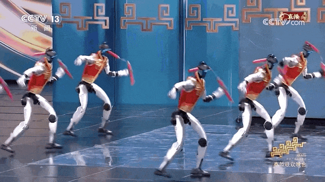 humunoid robots are dancing on the stage of the Chinese New Year Gala show