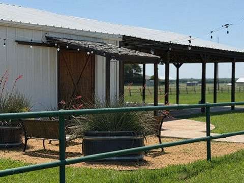 Covered patio and outdoor gathering area at Prosperity Event Venue in Argyle TX.