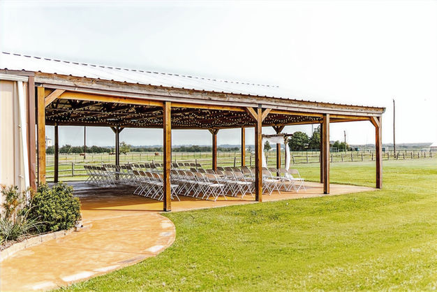 Covered outdoor pavilion and gathering space at Prosperity Event Venue in Argyle Texas.