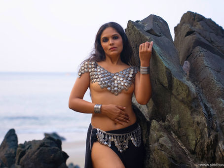 She is not loud. She is rooted. She is connected to the earth, the moon, the water, and the sun in ways that have nothing to do with mysticism and everything to do with attunement. She is the actual manifestation of nature vast, patient, cyclical, devastating when ignored and extraordinary when honoured.