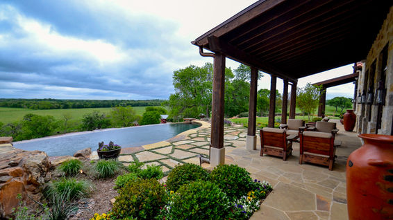 Denton county vanishing edge pool overlooking the countryside designed by Mike Farley.