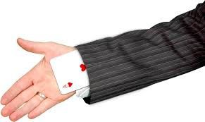card trick being performed by a magician using sleeve and hand