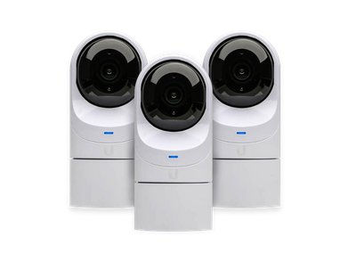 Three Ubiquiti UniFi UVC-G3-FLEX-3 video cameras.