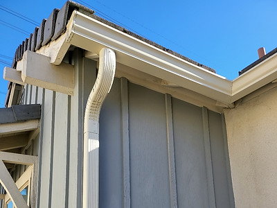 Honest Gutters uses aluminum corrugated downspouts.