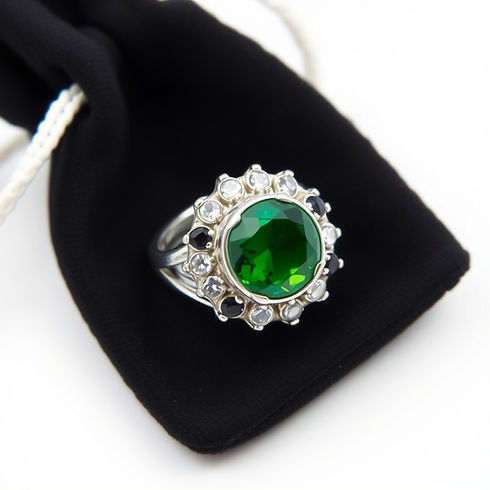 Gemstone studded silver ring with black baground .jpg