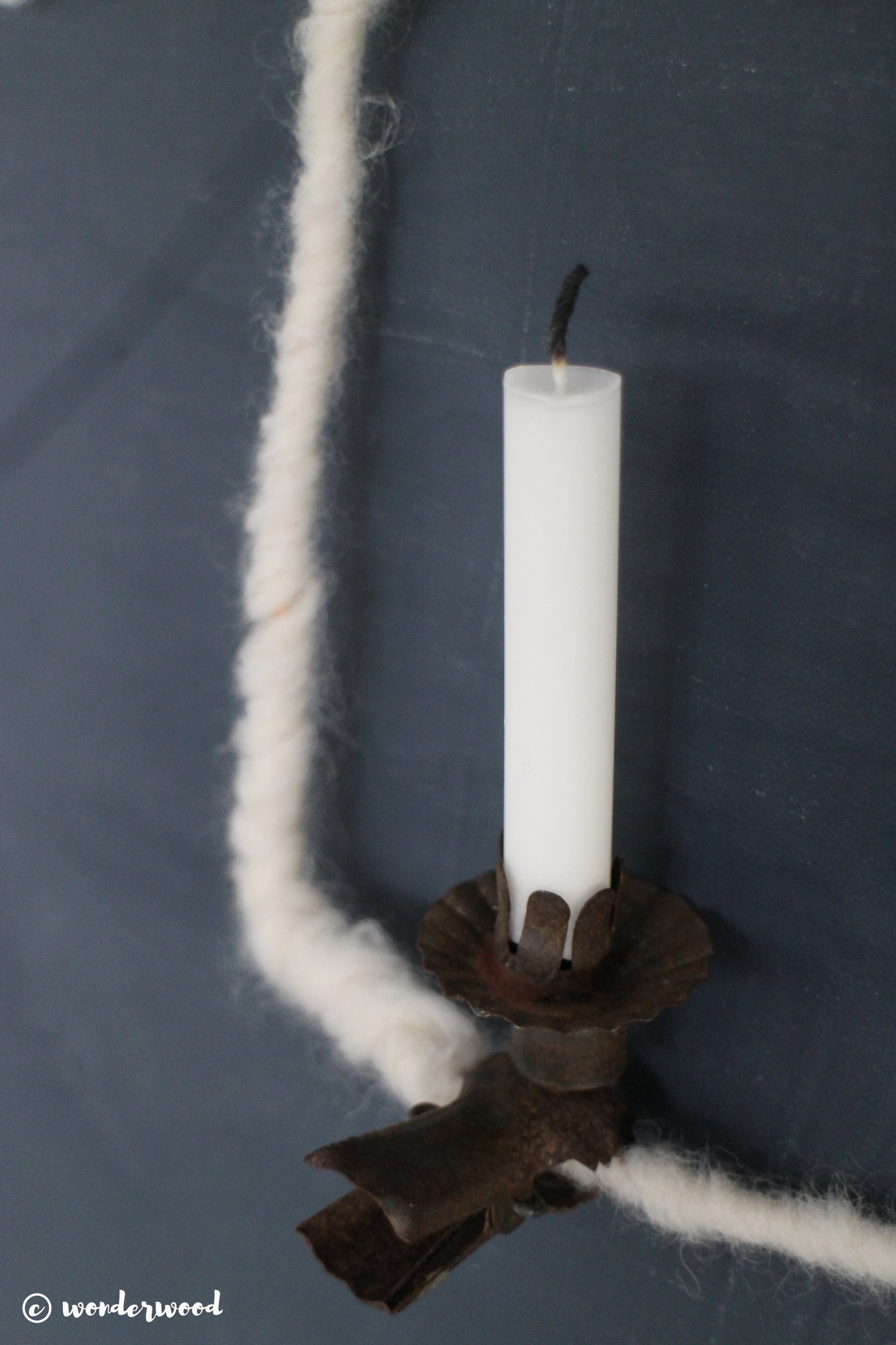 metal and wool ornament