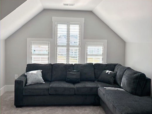 Leland "FROG" bonus room after the installation of custom plantation shutters on closing day.