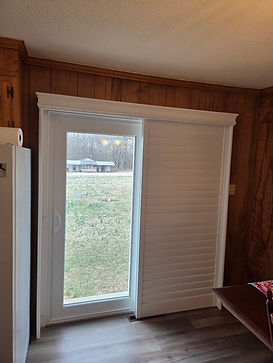 Plantation-shutter-on-sliding-door-in-open-position.