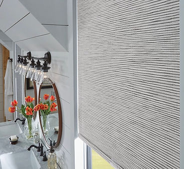 Roller shades in a farmhouse style bathroom