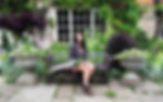 girl in garden flowers model heritage house