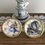 Thumbnail: Set of 4 Mini Dollhouse 1:12 Ceramic Alice in Wonderland Plates with Gold Border