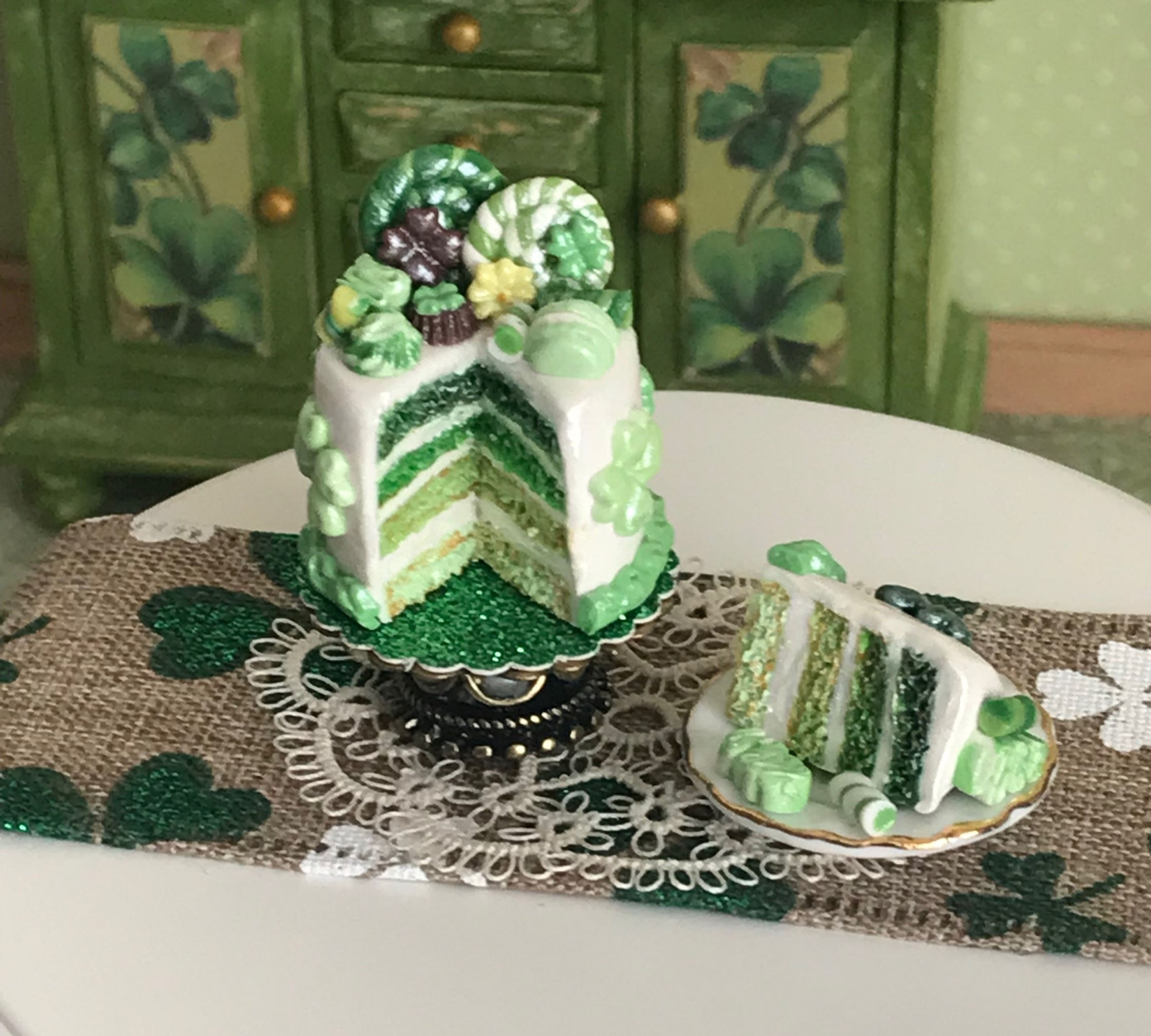 St. Patrick's Day Ombre Layered Candy Cake with Slice on Tray, Desserts