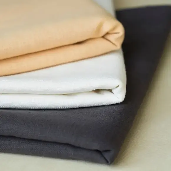 Coloured slip cloths dressing a bistro table setting