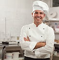 Professional restaurant laundry service cleaning chef uniforms - freshly laundered chef jackets and aprons in a Manchester ki