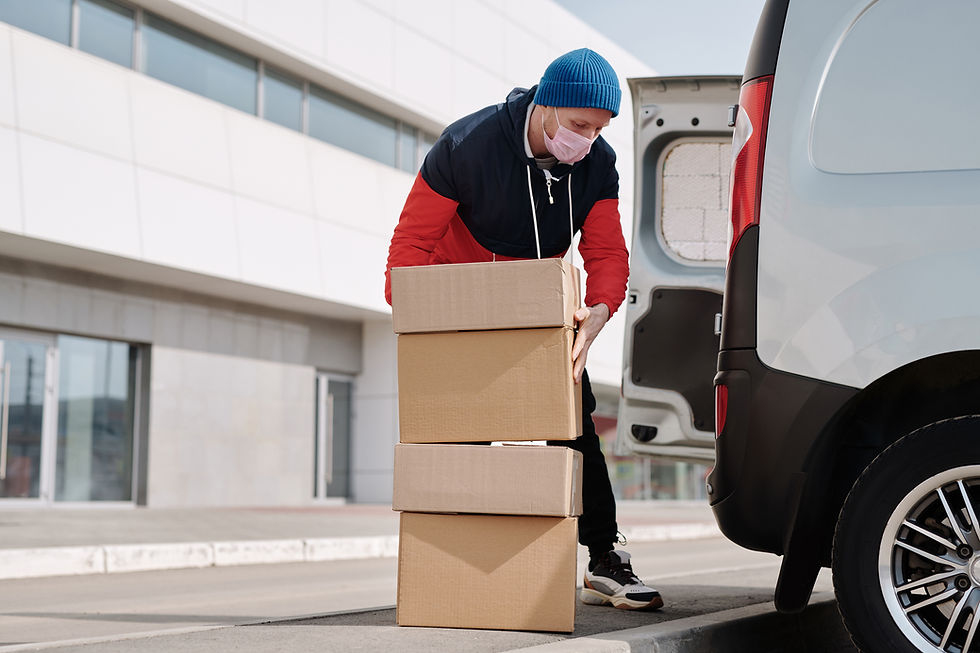 delivery-man-wearing-a-face-mask-carryin