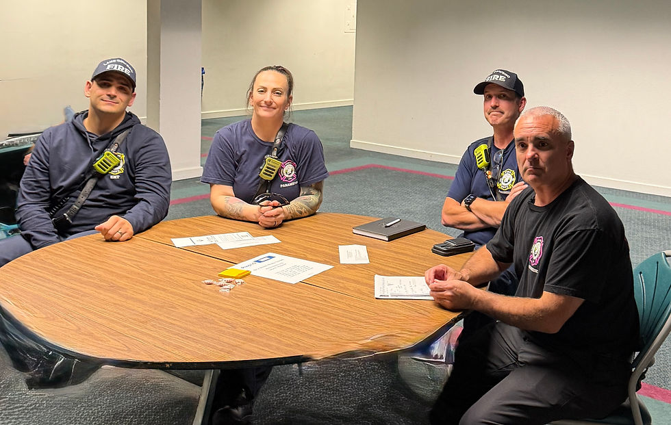 Chief Vachter with LO Fire Department Team Ben Sanders, Andrea and Cameron