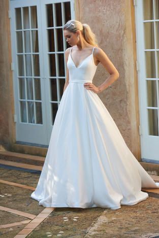 Aurora TC304 wedding dress, Aurora, Aurora Tania Olsen, Aurora TC304, Fitted bodice,
V-neckline,
Spaghetti straps,
Low v-back,
A-line silhouette,
Floor length skirt with train,
Soft satin fabric, SATIN DRESS, SATIN BRIDAL GOWN, POCKETS,
Fully lined,
Inner bra cups,
Low back zipper, Vintage white,
Style code: TC304, modern bridal gown, classic bridal gown, tania olsen wedding dress, wedding dress by tania olsen.
