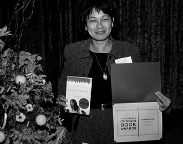 Sopha Hang with Book Award (2).jpeg
