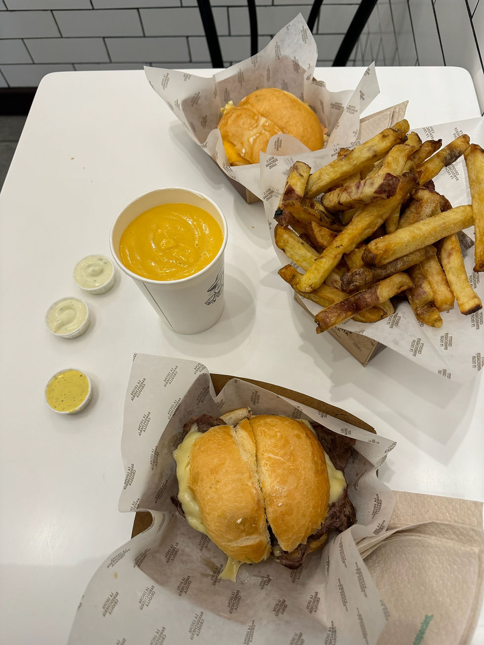 Sandwich, shake and fries on a table
