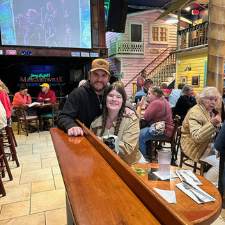 Two parakeets enjoying their time at Margaritaville in Key West Florida