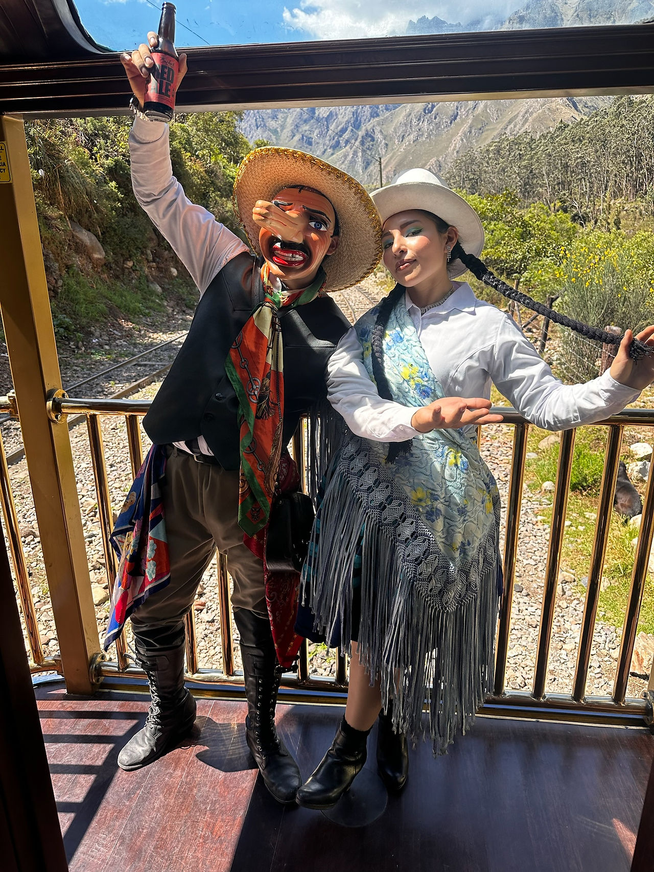 Peruvian Dancers on board PeruRail's Vistadome train to Machu Picchu
