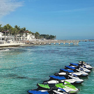 Jet skis lined up for tours with Barefoot Billy's in Key West
