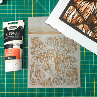 Orange Pebeo Lino ink with lino matrix and croissant print by Molly Gray