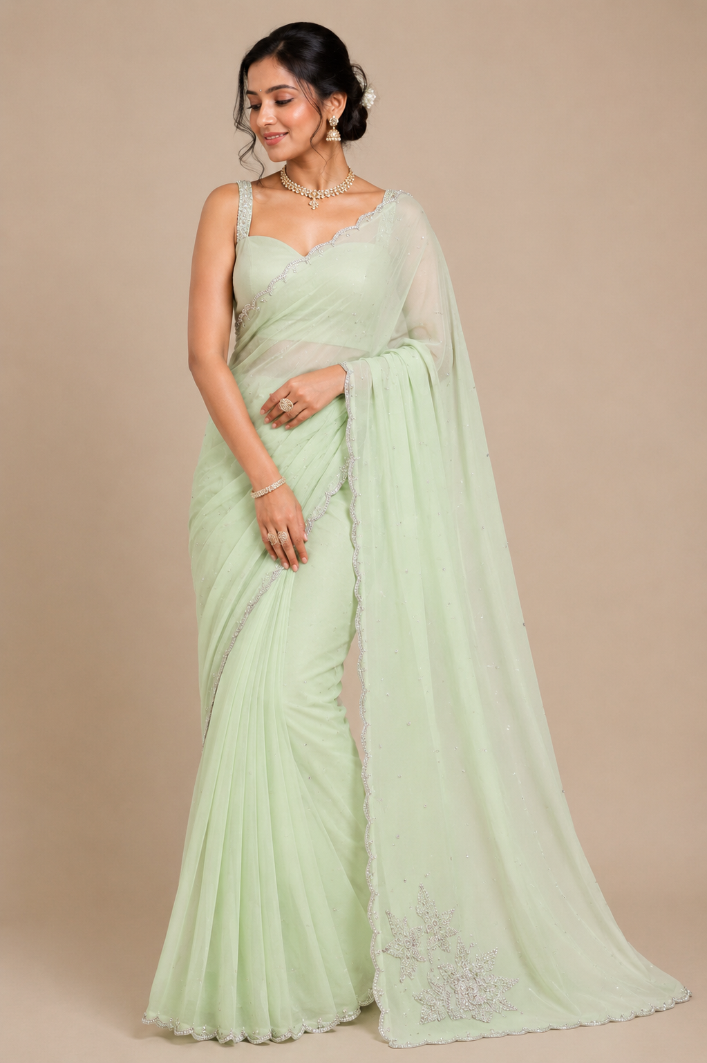 Pastel Mint Green Embroidered Chiffon Saree with Scallop Border