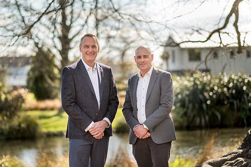 Rentworks Property Management owners Brent & Steve standing by the Avon river in Christchurch
