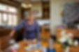 Photo of Ann preparing a delicious home-cooked breakfast at Hurunui Homestead, Canterbury luxury accommodation