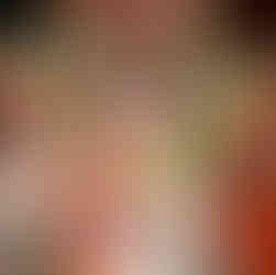 bride surrounded by floral bouquets at vintage rustic barn country wedding in toledo wa lewis county