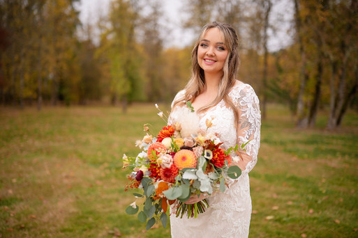 beautiful bridal portrait of bride at wedding in fall forest meadow in toledo wa at county n lace