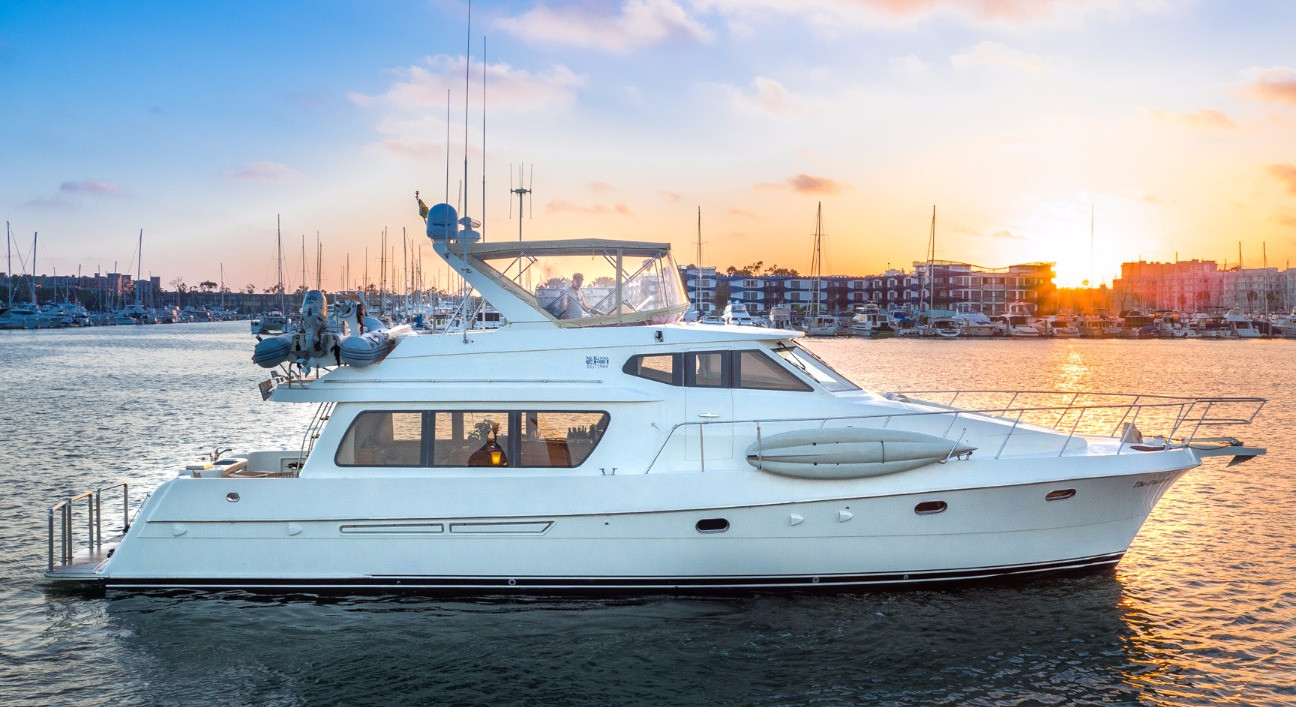 The Duchess yacht at sunset in Marina del Rey, California, a 63-foot motor yacht used for intimate burial at sea ceremonies for up to 6 guests