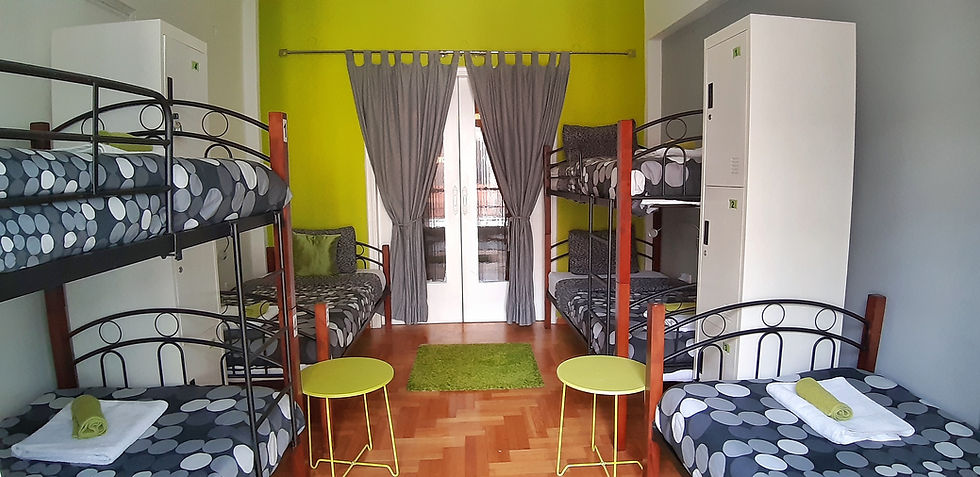 Full view of the 6-bed mixed dormitory room in a central Athens rental shared apartment with lockers