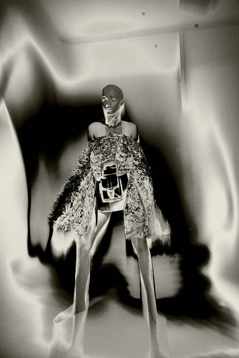 model wearing fashion dress in a photographic studio