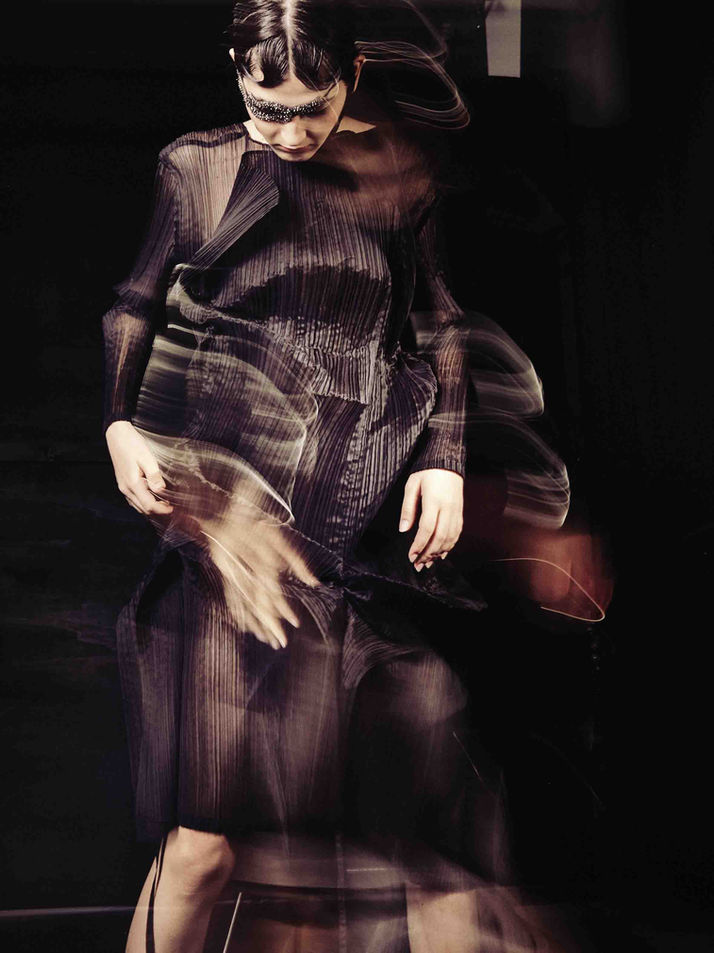 shooting in a dark environment with a woman model wearing cool outfit