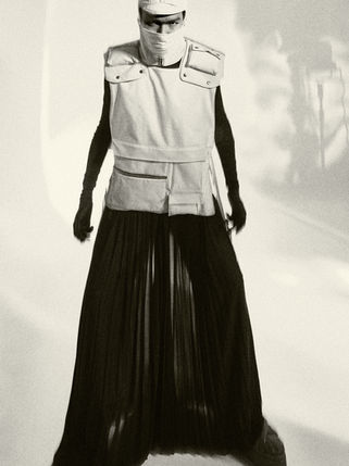 model wearing long dress in a photographic studio