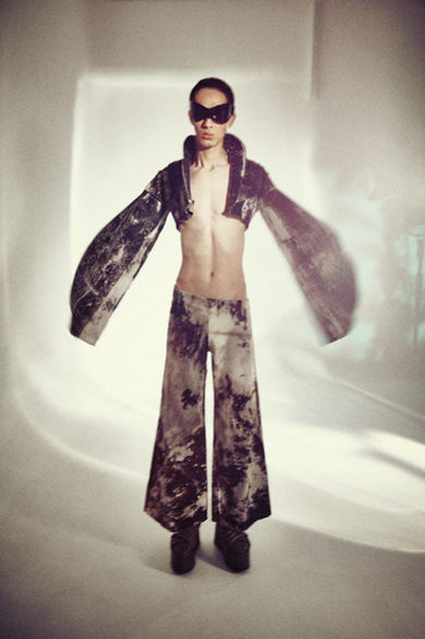 model wearing fashion dress in a photographic studio