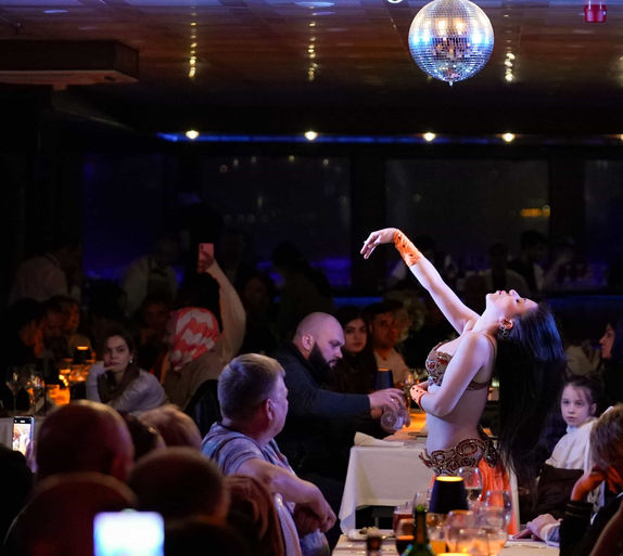 Belly dancer performing during Bosphorus dinner cruise Turkish night show in Istanbul