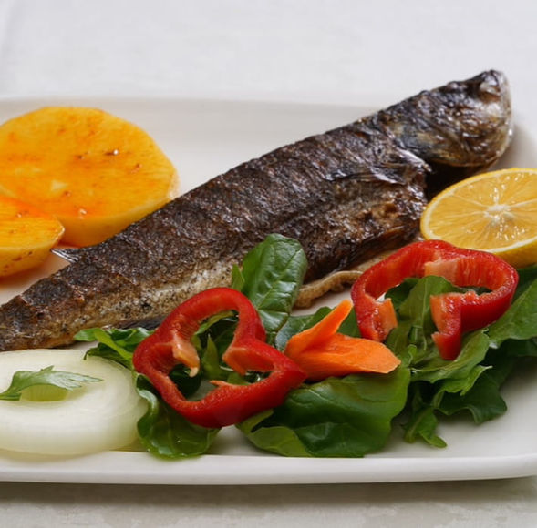Dinner table setup with food on Bosphorus dinner cruise Turkish night show in Istanbul