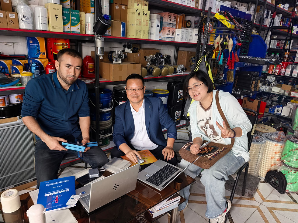 XZAPART visiting local distributor in Uzbekistan auto parts store, discussing SINOTRUK SHACMAN FOTON axle parts cooperation