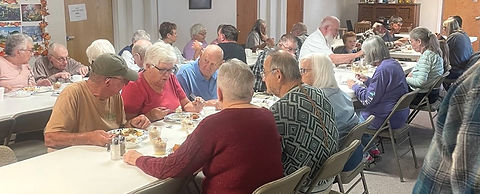 Every month more and more folks “Gather at the Table” for fellowship and a free meal serve