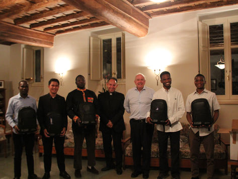 A meeting with the president of the CARF Foundation: handing of a Mass kit to five departing seminarians