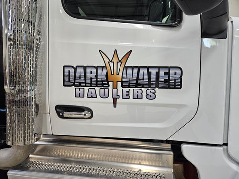 DarkWater Haulers logo on truck door