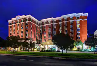 caecchf-hilton-columbia-center-exterior-night.webp